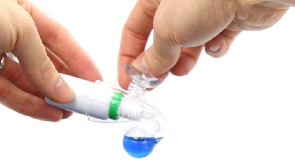 Inyectar solución en el comprobador de gotas